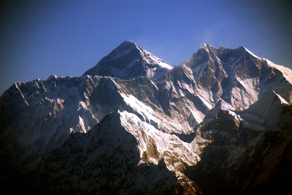 Kathmandu Mountain Flight 08-2 Everest, Nuptse, Lhotse The summit of Mount Everest (8850m) pokes up above the Nuptse (7861m) to Lhotse (8516m) south face from the Kathmandu Mountain flight.